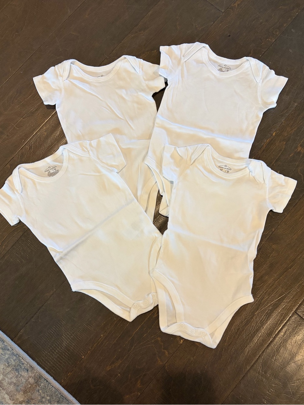 Essential White Baby One-Piece Bodysuits (4-Pack)